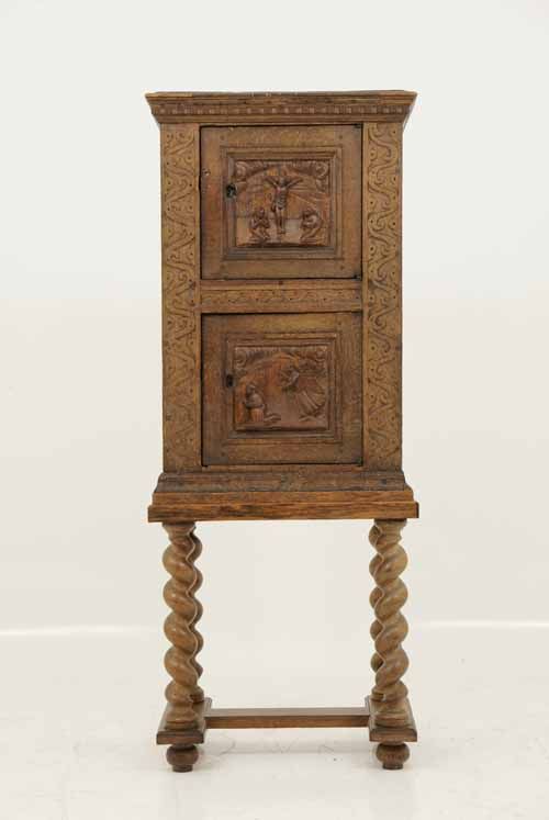 Heavily carved oak bible box on barley twist stand. Two (2) carved 