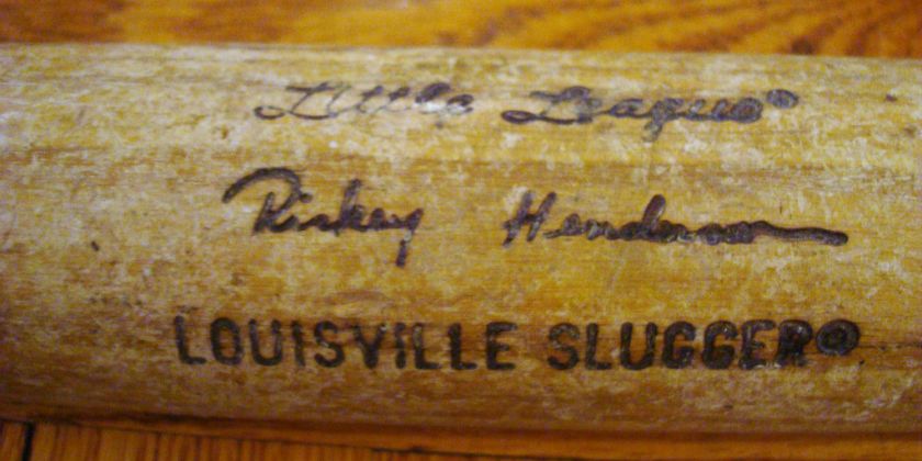   Rickey Henderson FLAME TEMP LOUISVILLE SLUGGER BASEBALL BAT 125LLF