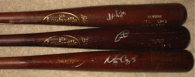   2012 MINNESOTA TWINS AUTOGRAPHED BATS (CAPPS, PAVANO, CASILLA)  